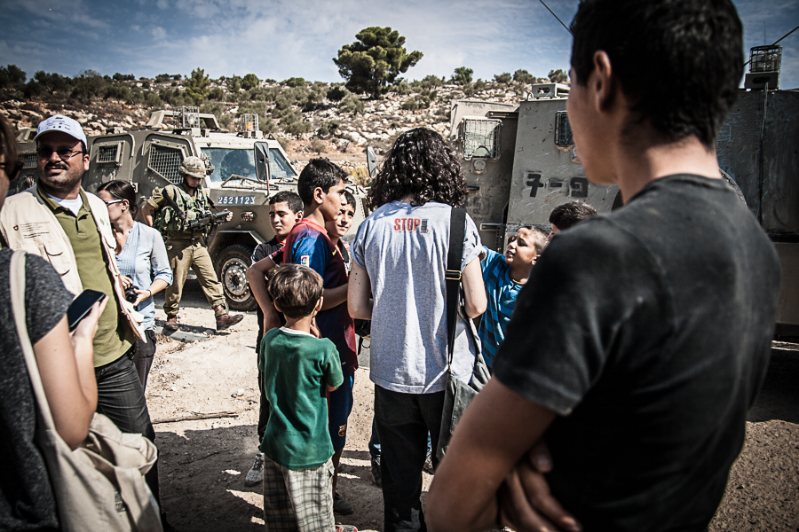 IDF soldiers block the way for Palstinian Olive farmers near the village of Salem in the West Bank, October 2012 (1) (2)