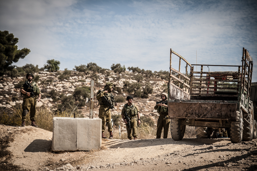 IDF soldiers block the way for Palstinian Olive farmers in the West Bank, October 2012 (5)